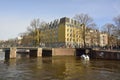 View of Leliegracht bridge spanning Prinsengracht canal in Amsterdam